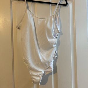 Brand new one piece bathing suit with side detail